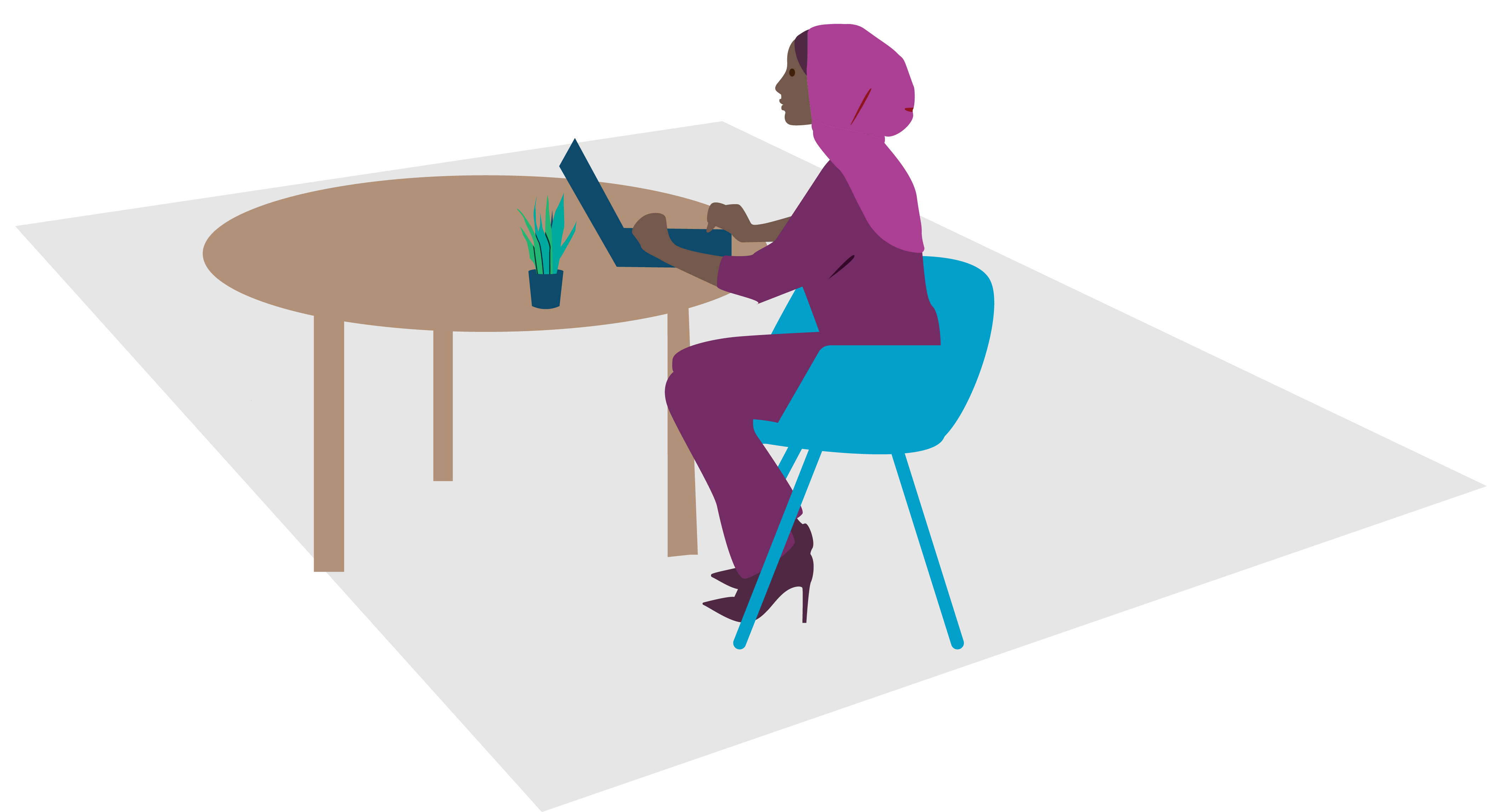 Woman in hijab typing on laptop