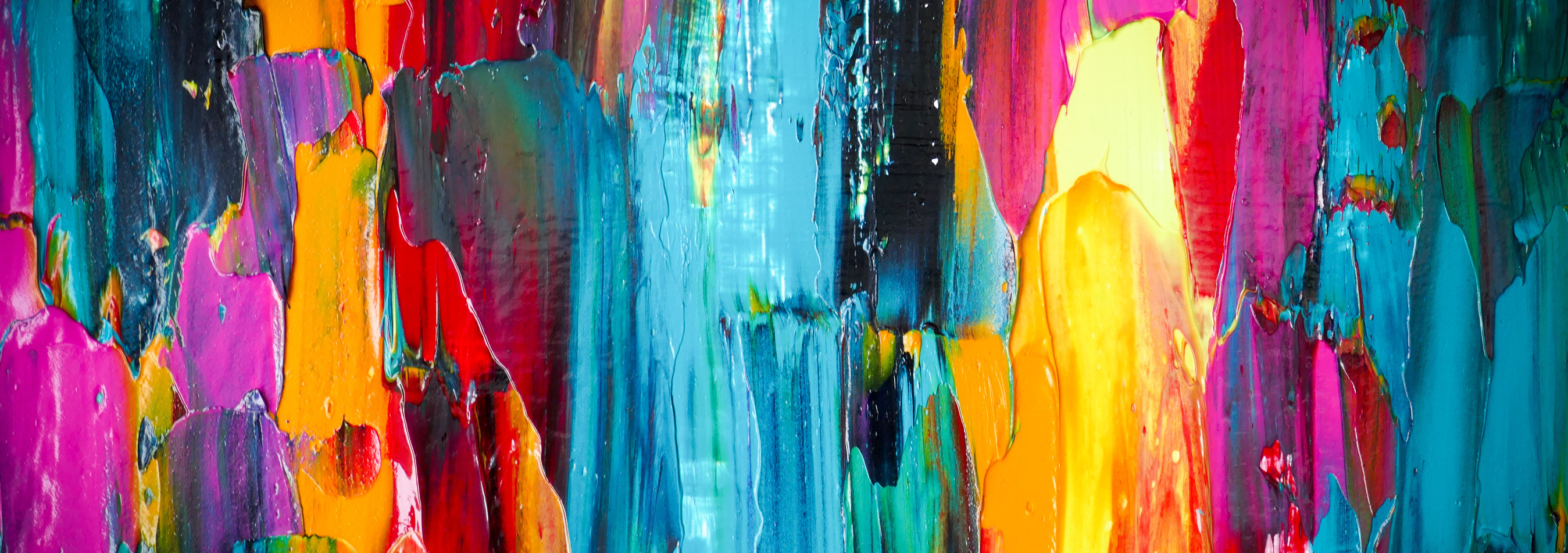 Colorful abstract painting with vibrant strokes of teal, red, pink, orange, yellow, and blue. The bold, textured brushstrokes convey energy, hope, and movement—symbolizing creativity, connection, and positive change.
